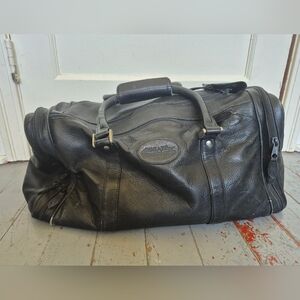 Bugatti Leather Duffel Bag With Subtle All Weather Windows Logo